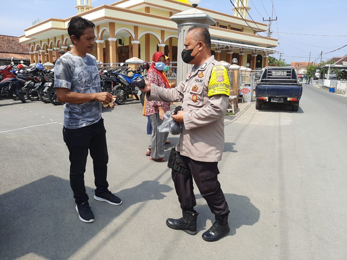 Polisi Terus Beri Himbauan Cegah Covid-19 Dan Bagikan Masker