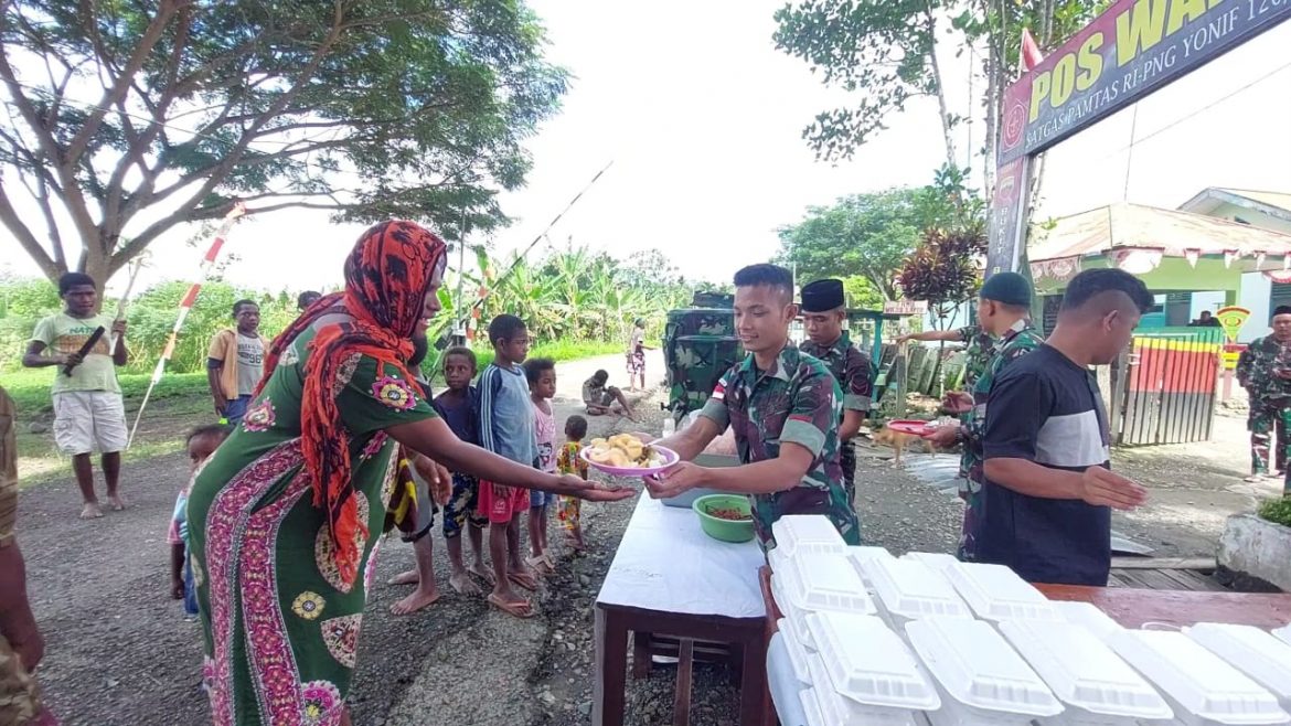 Satgas Yonif 126/KC Berbagi Berkah Kepada Masyarakat