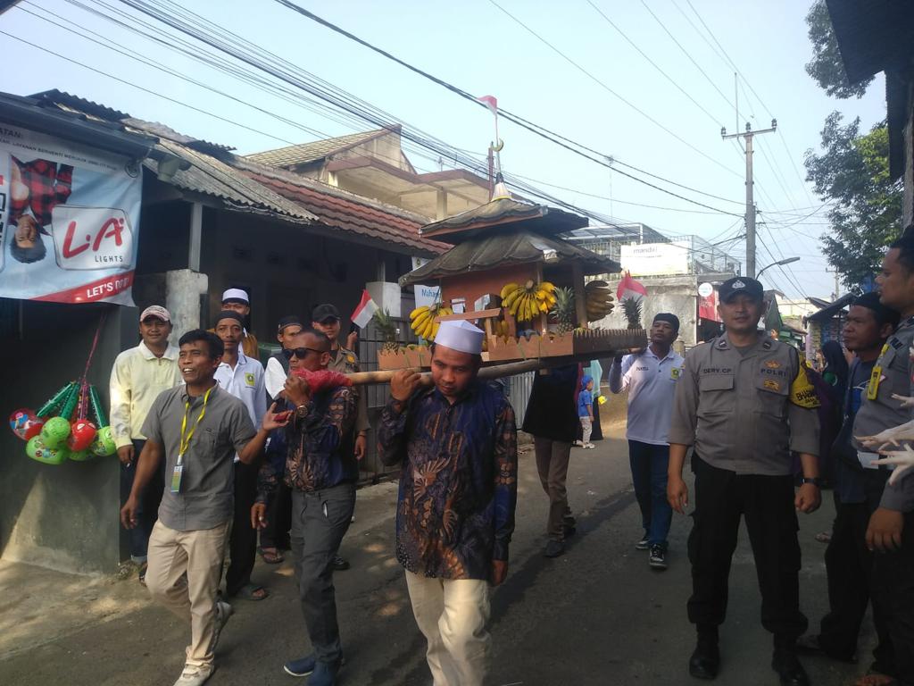 Bhabinkamtibmas Dan Bhabinsa Lakukan Pengamanan Serta Monitoring Giat Dongdang Dalam Rangka Memperingati Tahun Baru Islam 10 Muharam 1445 H