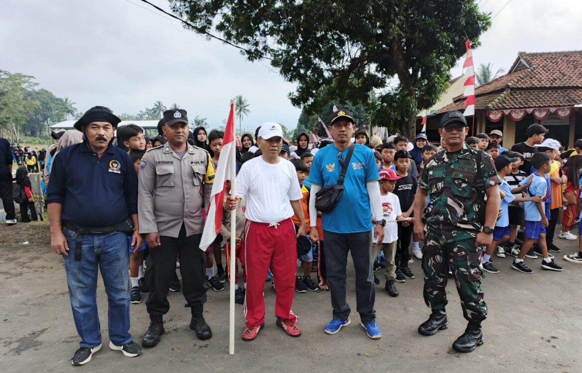 Polsek Cihaurbeuti Polres Ciamis Hadiri dan Beri Pengamanan Haul Ponpes Ishlahil Mubtadiin